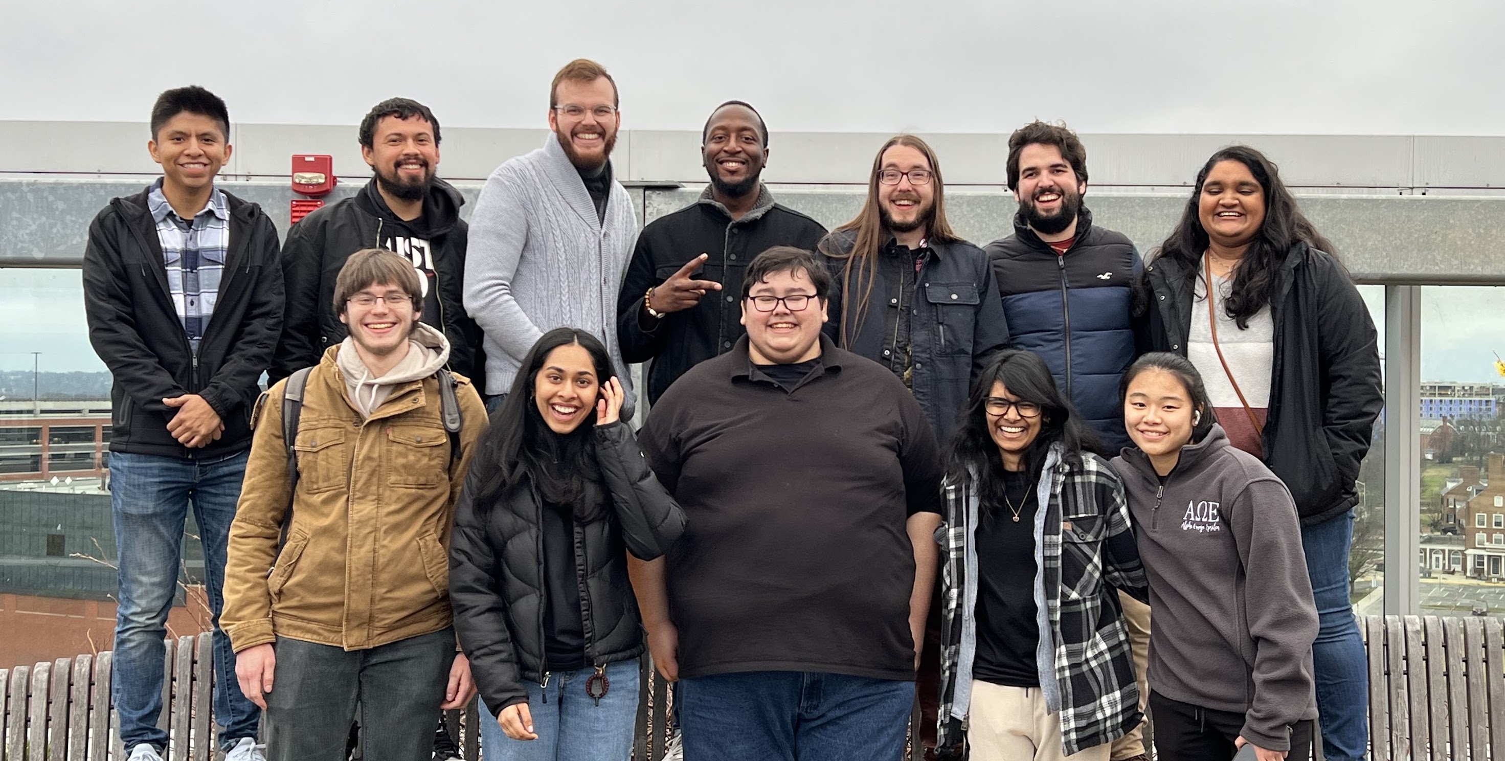 Staffworld student workers and alumni volunteers on the Iribe Center rooftop